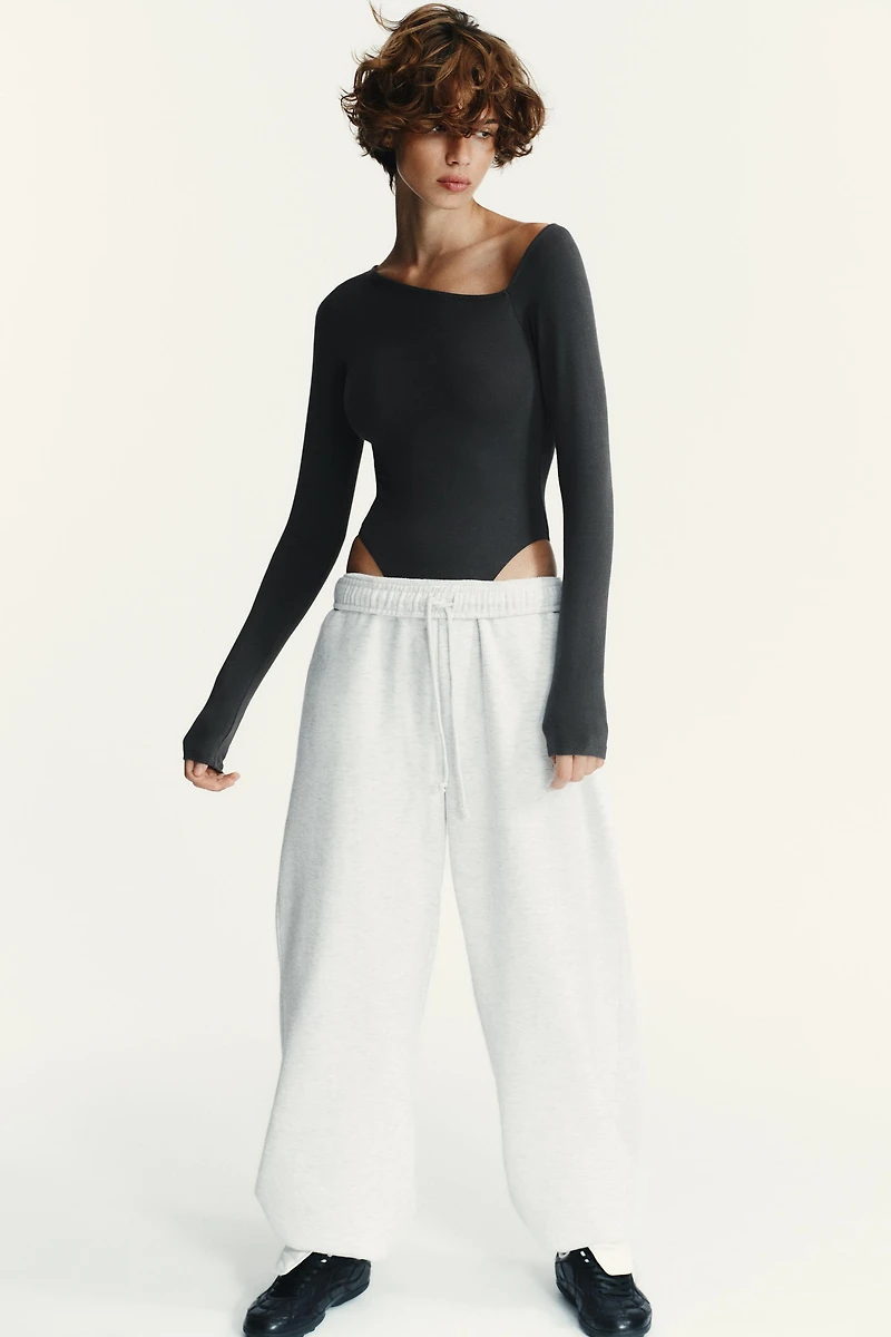 ASYMMETRIC LONG SLEEVE BODYSUIT