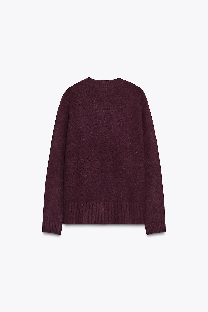 PULL EN MAILLE COL V