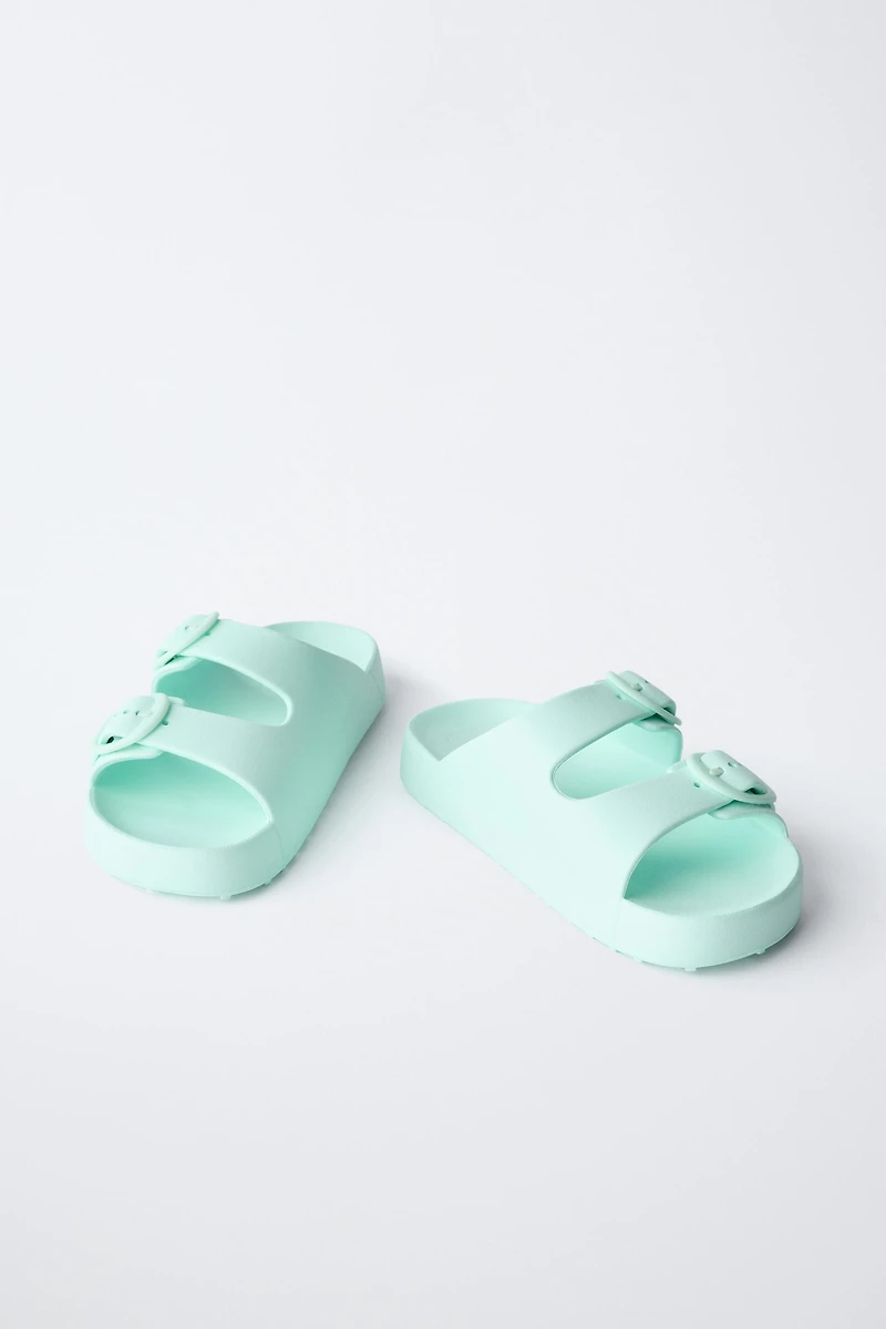 SANDALES À BOUCLES GOMMÉES