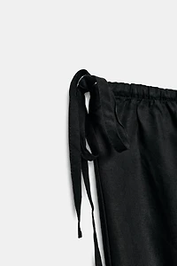 TIED ANKLE-LENGTH FLOWY PANTS