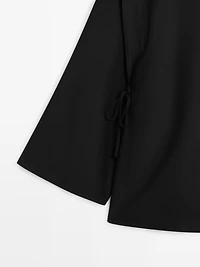 Mock turtleneck shirt with tie details