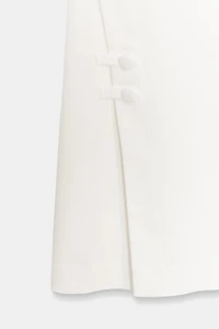 PANTS WITH SLIT HEMS