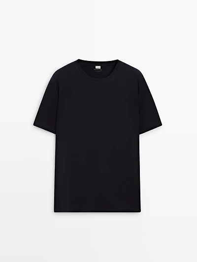 Short sleeve pyjama top and striped trousers