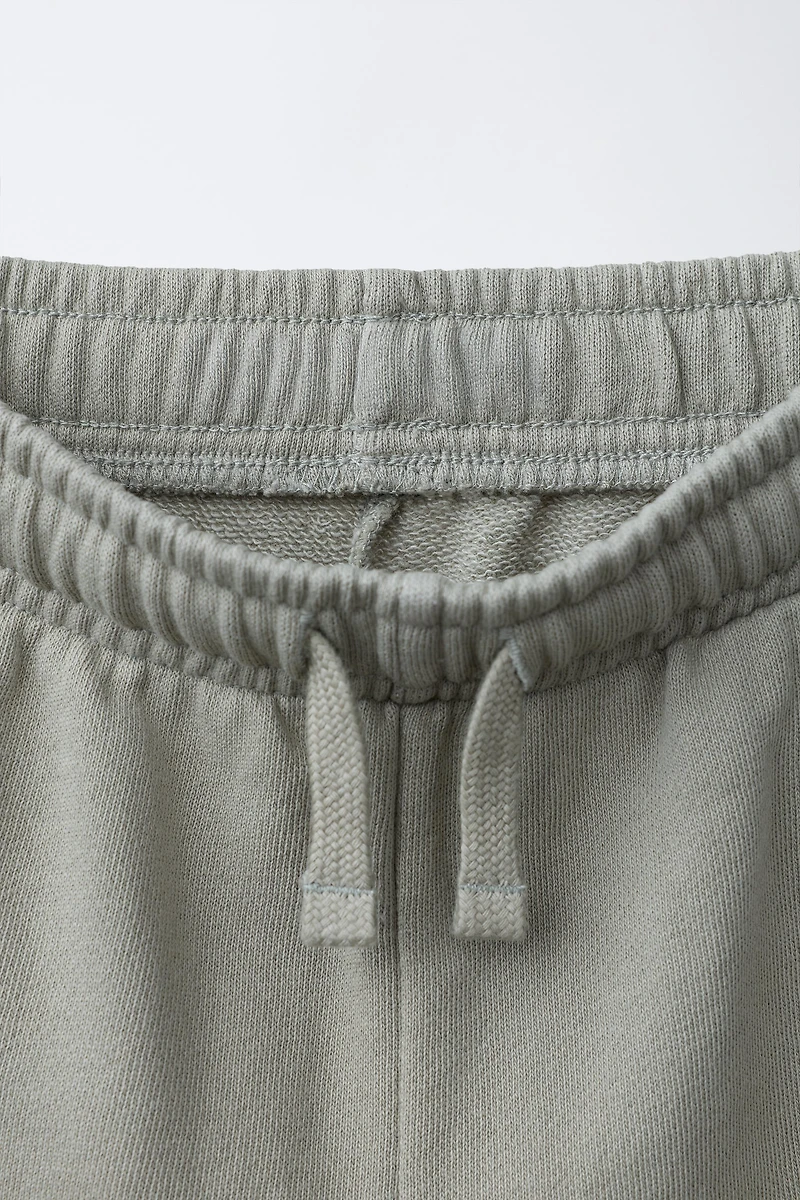 GARMENT DYED BARREL CUT PANTS