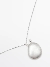 Collier pendentif métallique