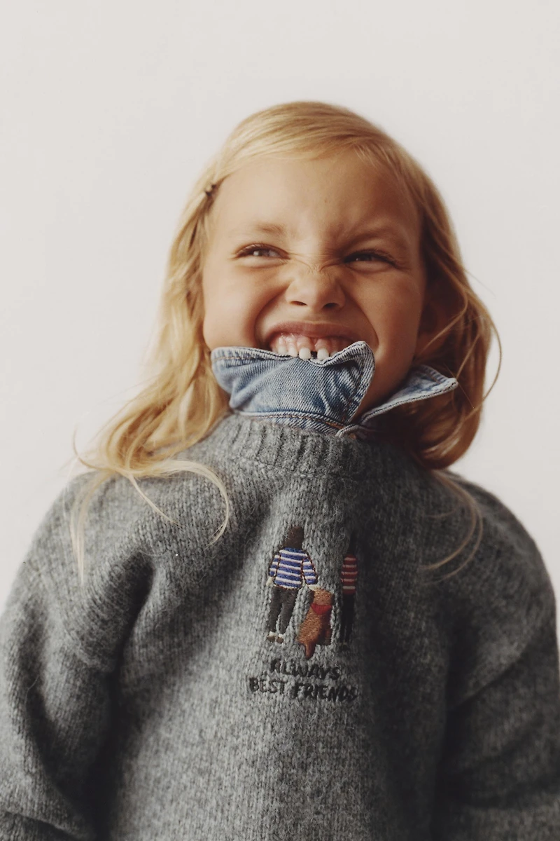 EMBROIDERED KNIT SWEATER