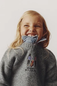 EMBROIDERED KNIT SWEATER