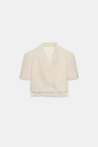 VESTE COURTE À BORDURE DENTELLE