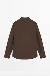 Flowing blouse with ruffles