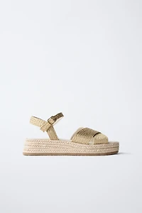 BRAIDED BODY SANDALS