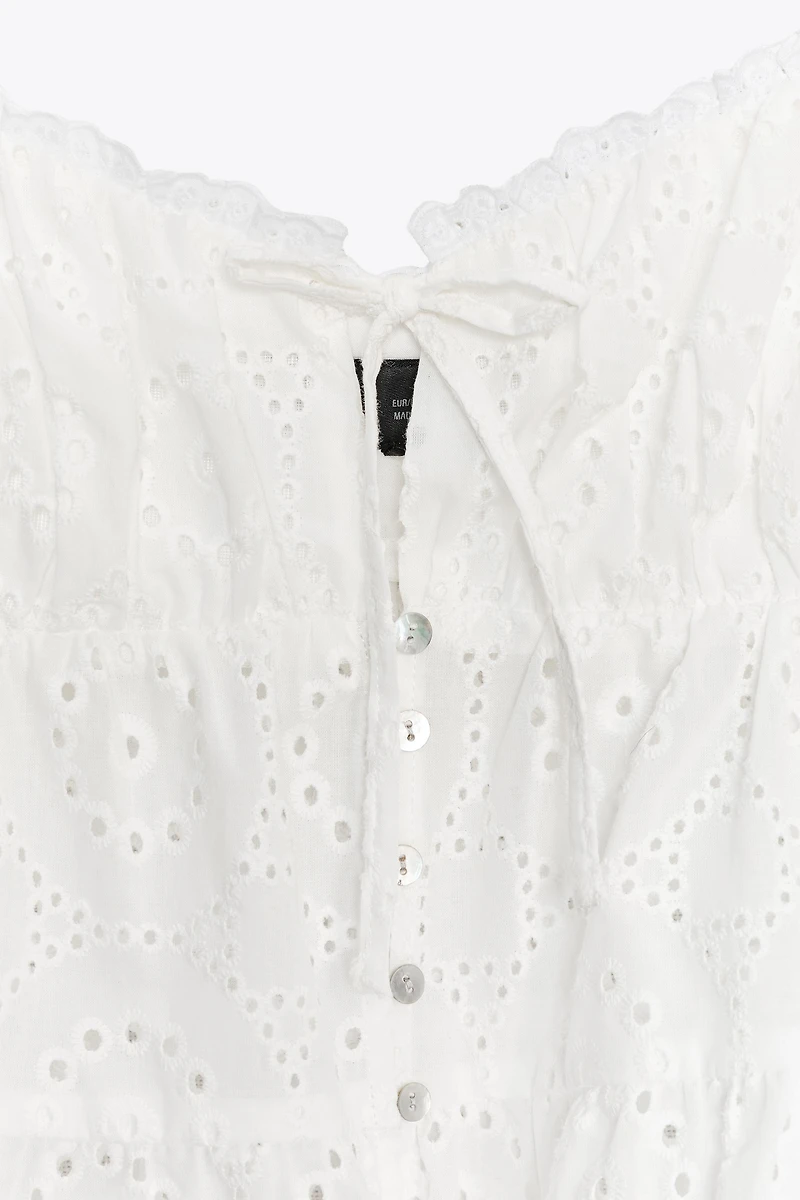 EMBROIDERED EYELET TOP
