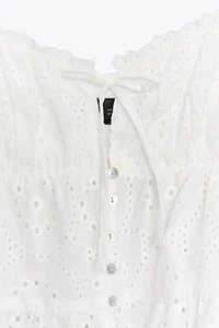 EMBROIDERED EYELET TOP