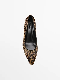 Heeled leopard print shoes