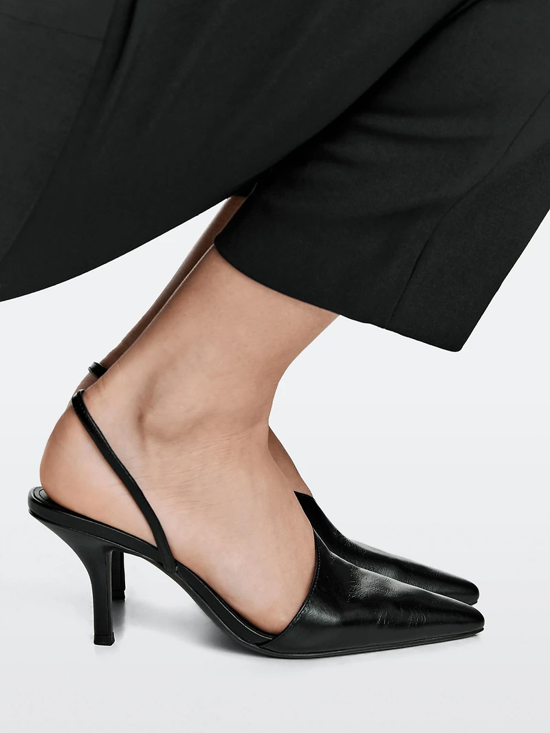 Asymmetric high-heel shoes