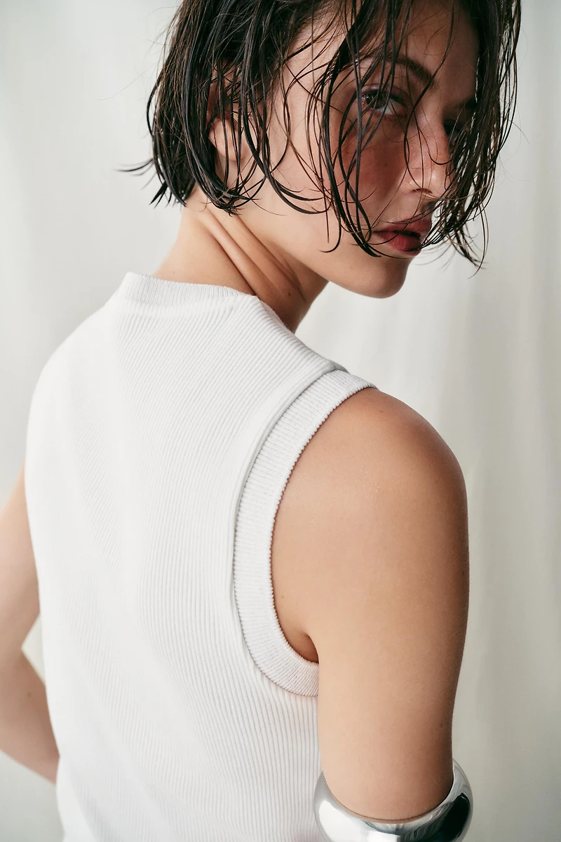 TOP À BOUTONS
