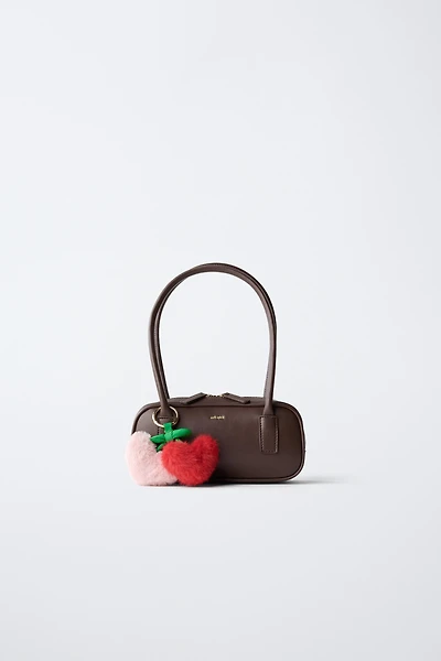 SAC PORTÉ ÉPAULE À CHARMS