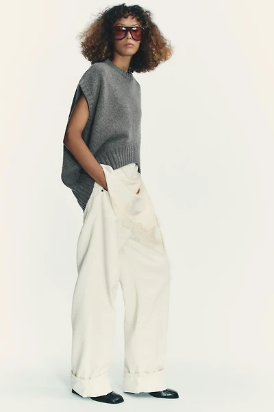 GILET AVEC LAINE OVERSIZE À OURLET ASYMÉTRIQUE