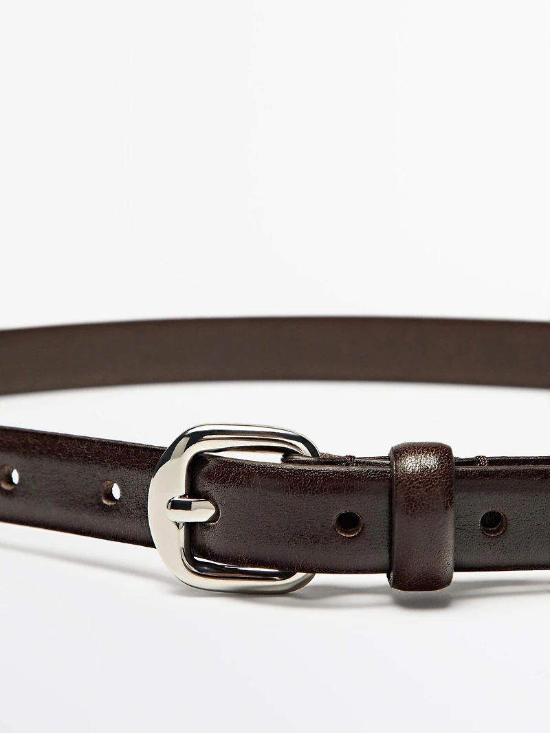 Leather belt with arched buckle