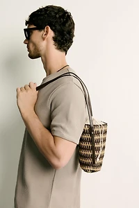 VERTICAL WOVEN CROSSBODY BAG