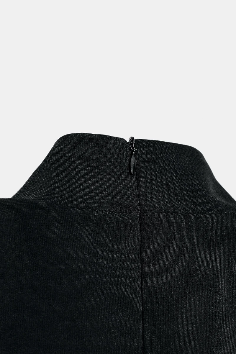 TOP PÉPLUM SANS MANCHES