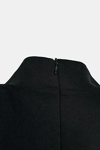 TOP PÉPLUM SANS MANCHES