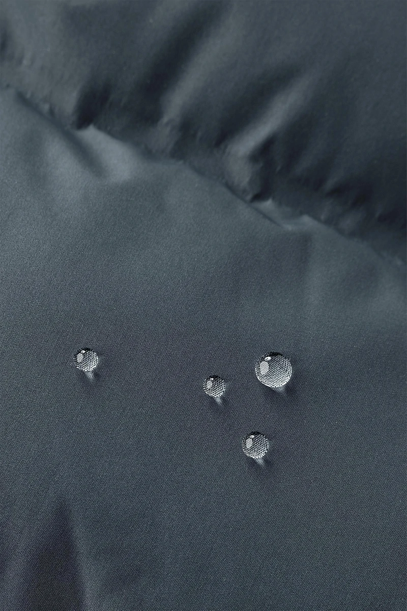 MANTEAU REMBOURRÉ ÉTIQUETTE DÉPERLANT