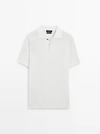 Polo en maille texturée de coton