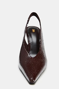 EMBOSSED ANIMAL PRINT HEELS