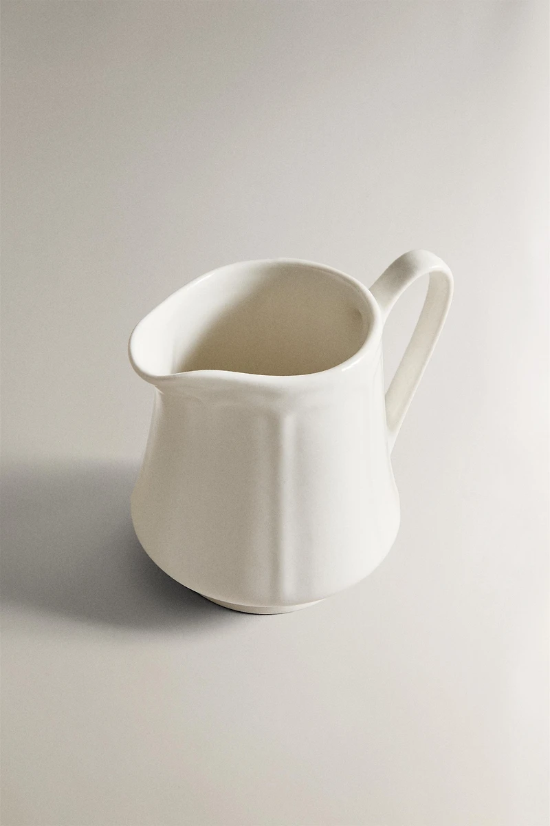 PORCELAIN CREAM PITCHER WITH RAISED PATTERN