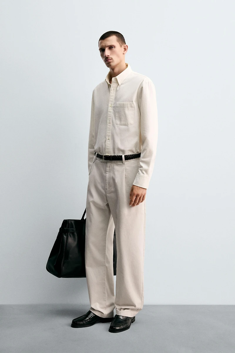 RELAXED FIT PLEATED PANTS