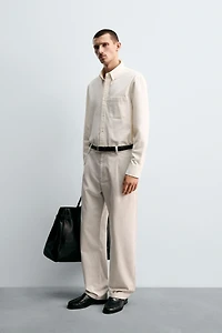RELAXED FIT PLEATED PANTS