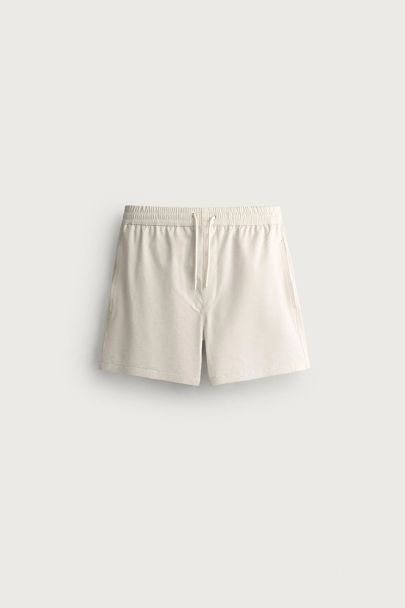 MID-LENGTH SEERSUCKER SWIMSUIT