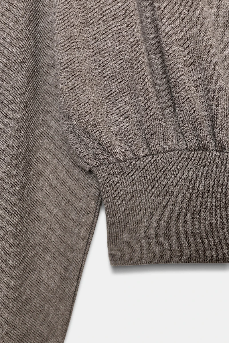 PULL DOUX À MANCHES LONGUES