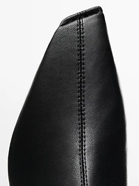 Stretch heeled boots