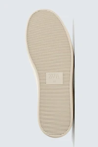 BASKETS EN CUIR