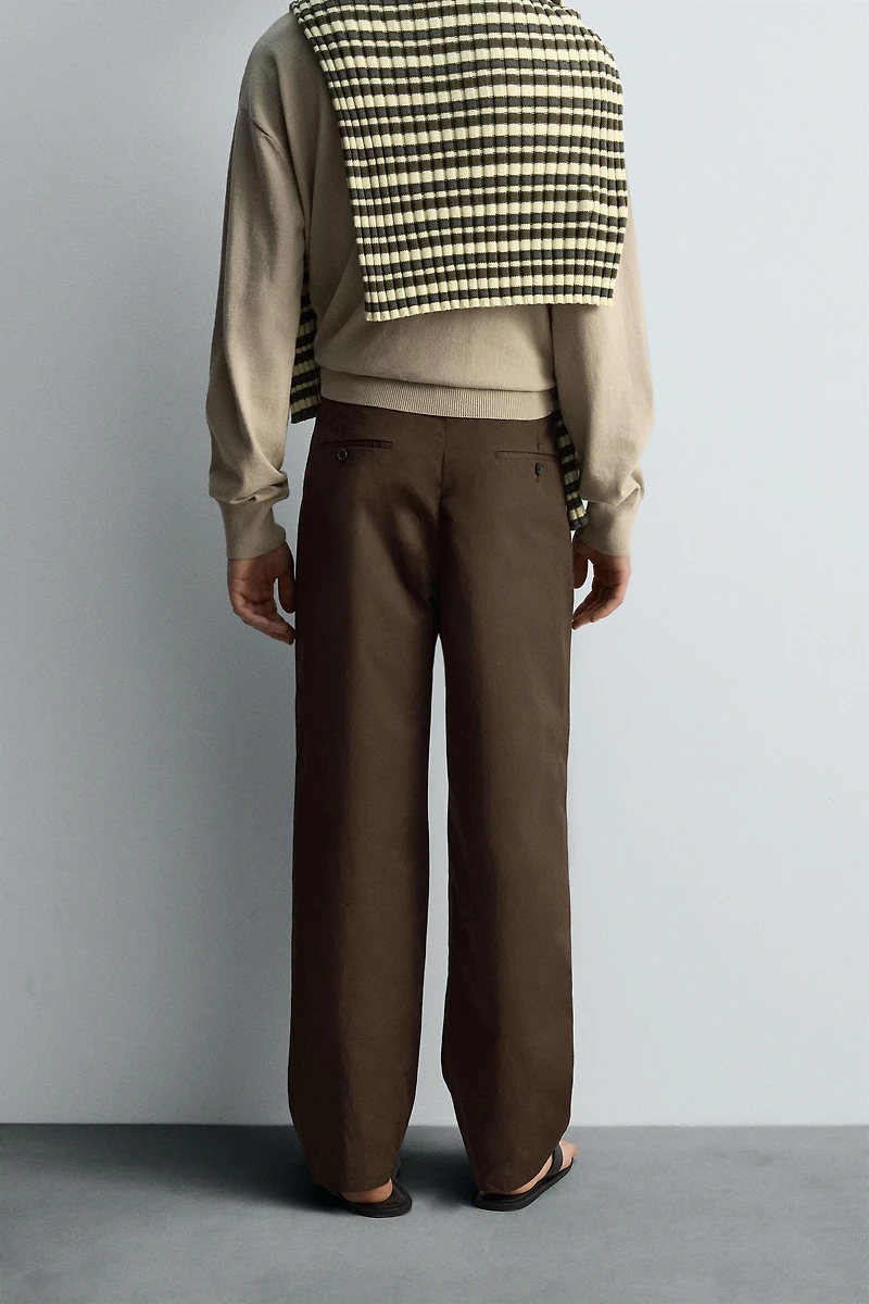 LIMITED EDITION PLEATED CHINO PANTS