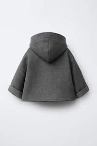 MANTEAU MANTECO À CAPUCHE