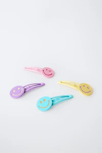 PACK OF FOUR SMILEYWORLD ® HAIR CLIPS