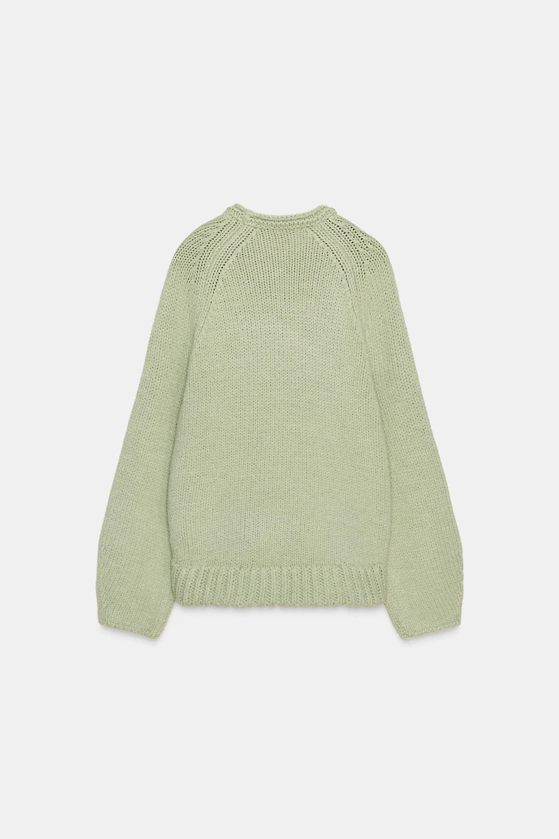 PULL EN MAILLE À BAS ASYMÉTRIQUE