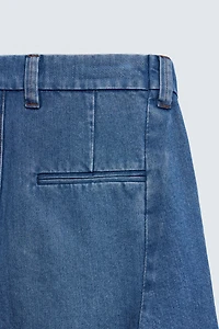 RELAXED FIT PLEATED DENIM SHORTS