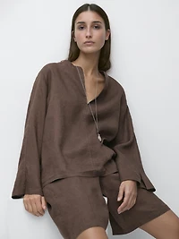 100% linen blouse with topstitching detail