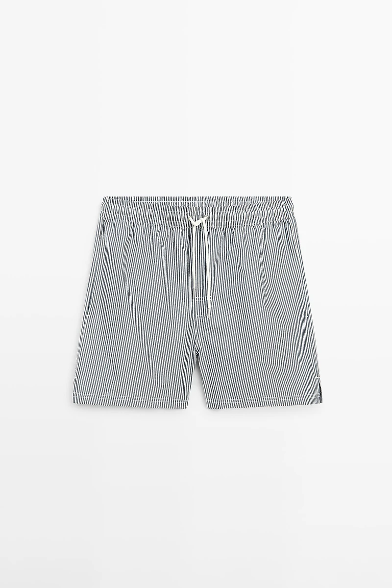 Swimming trunks with striped details