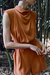 BELTED SHOULDER PAD JUMPSUIT