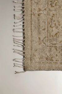 WOOL AREA RUG WITH A FLORAL PRINT