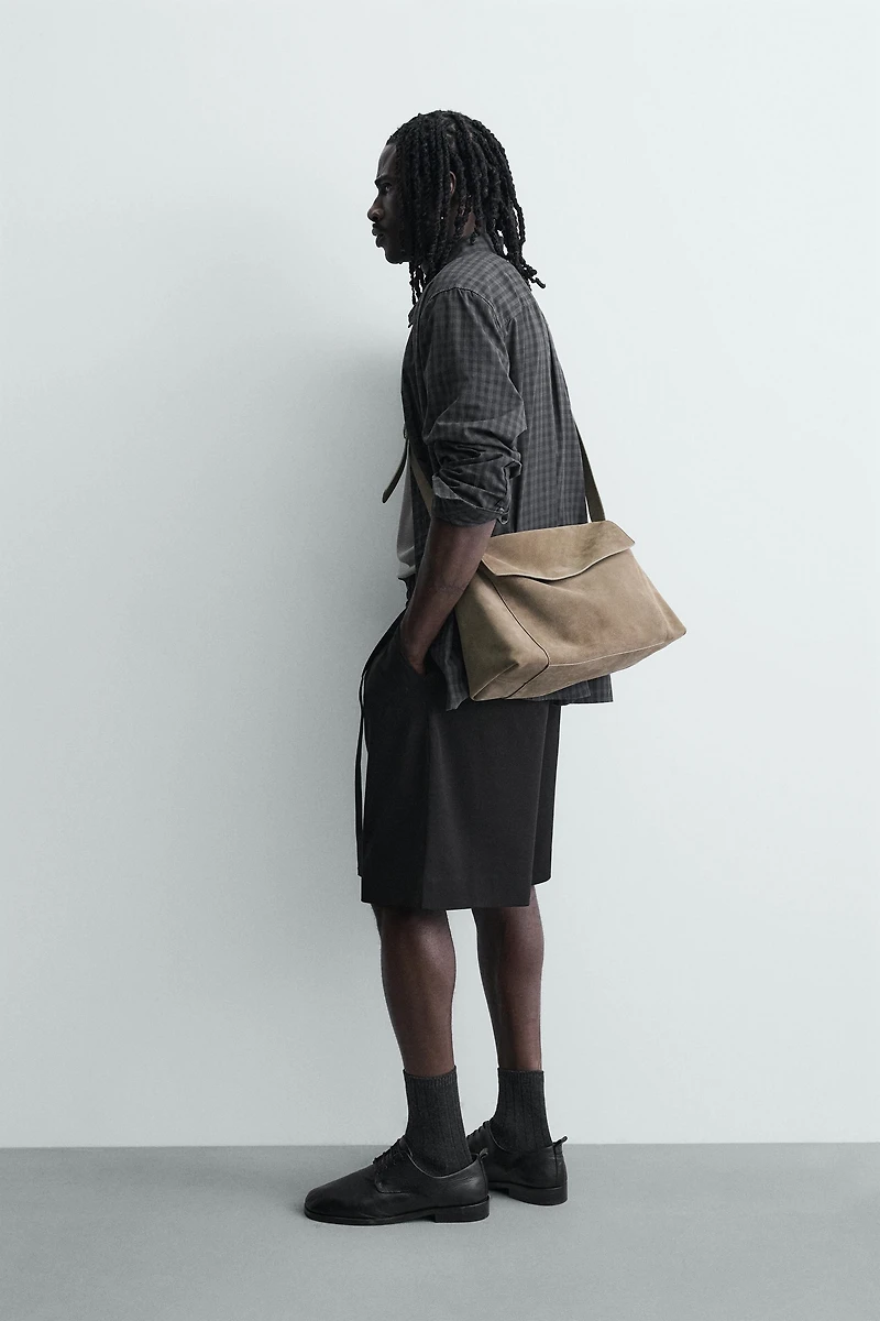 BELTED PLEATED RELAXED FIT SHORTS