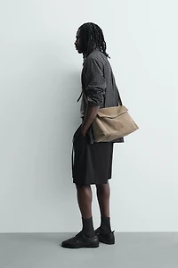 BELTED PLEATED RELAXED FIT SHORTS