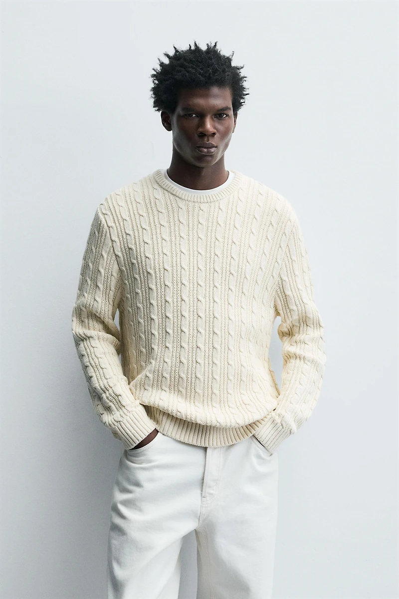 TEXTURED WOVEN SWEATER