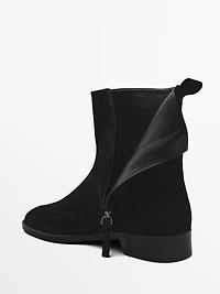 Bottines plates en croûte de cuir