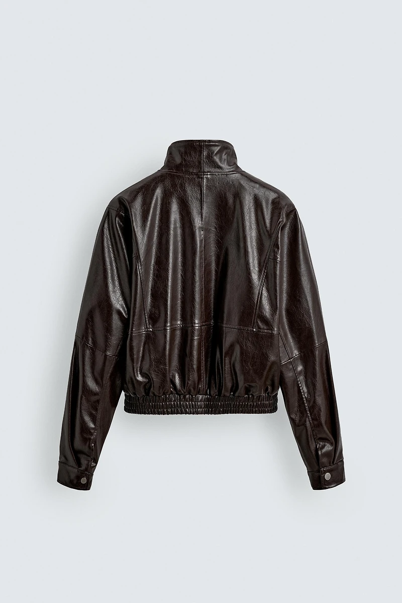 BLOUSON COURT MATIÈRE SYNTHÉTIQUE
