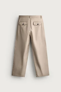 STRAIGHT FIT PLEATED PANTS
